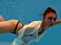Big tits Anastasia Ocean swims naked underwater