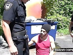 Gay Threesome on parking lot in police uniform in porn reality show