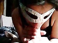 Masked amateur sucks cock in homemade video