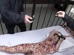 Busty Asian slave gets her marvelous body covered in hot wax