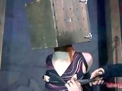 Redhead slave gets her head boxed and receives punishment BDSM